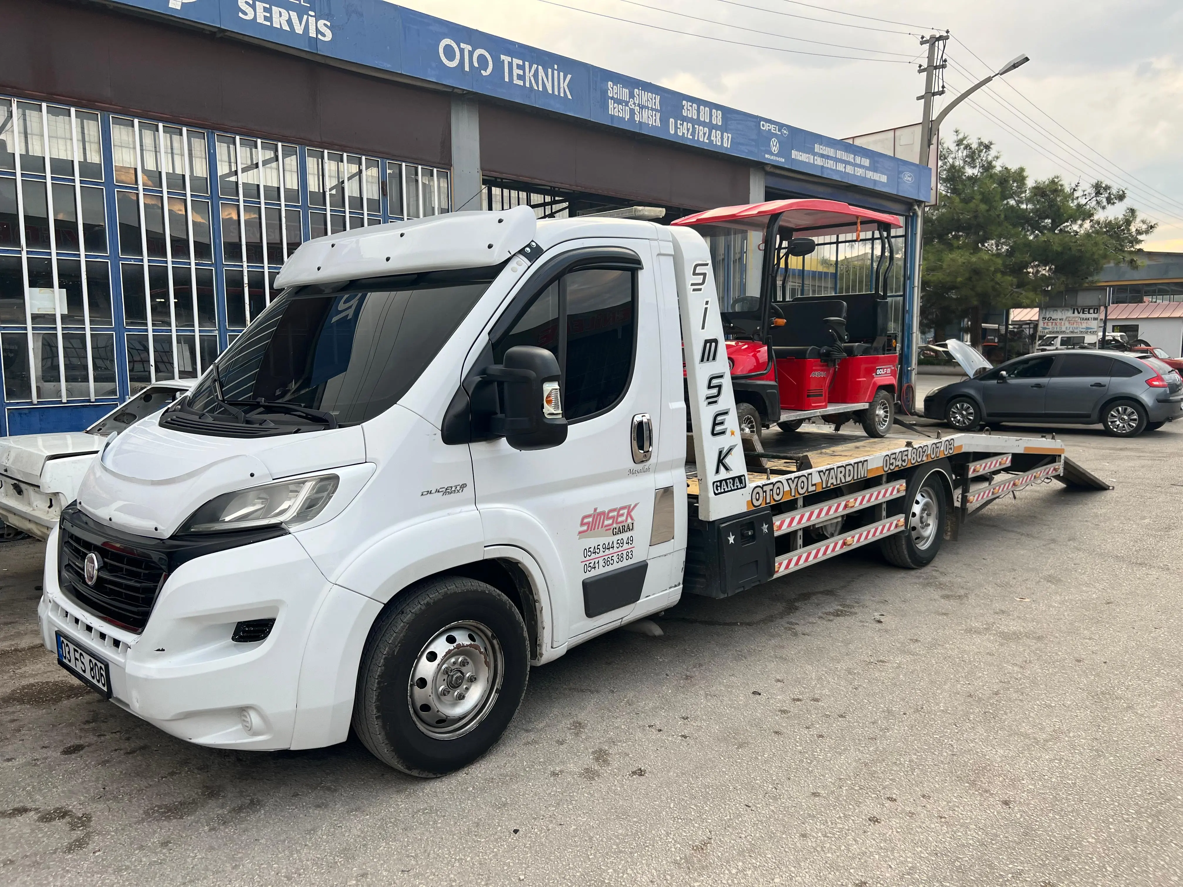 Golf arabası taşıma, &ccedil;ekici hizmeti